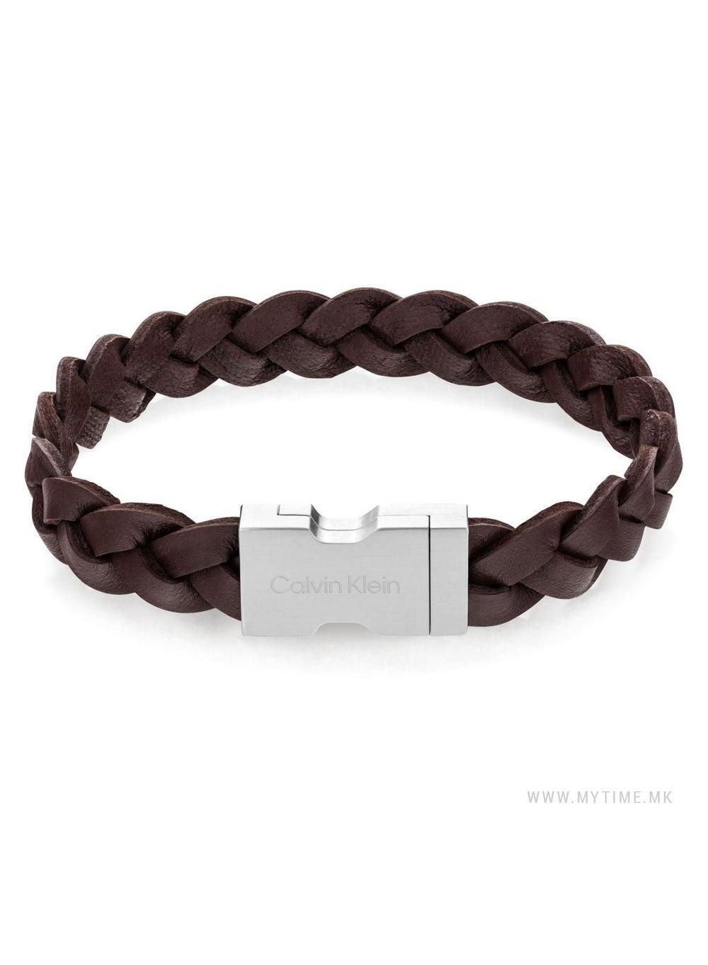 سوار جلدي فاخر مع شعار مزخرف - أناقة لكل المناسبات - Image 1