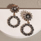 buy-sohi-circular-intricate-daisy-drop-earrings_uo5