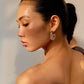 buy-noya-stella-circle-hoop-earrings-18k-gold-plated_iku