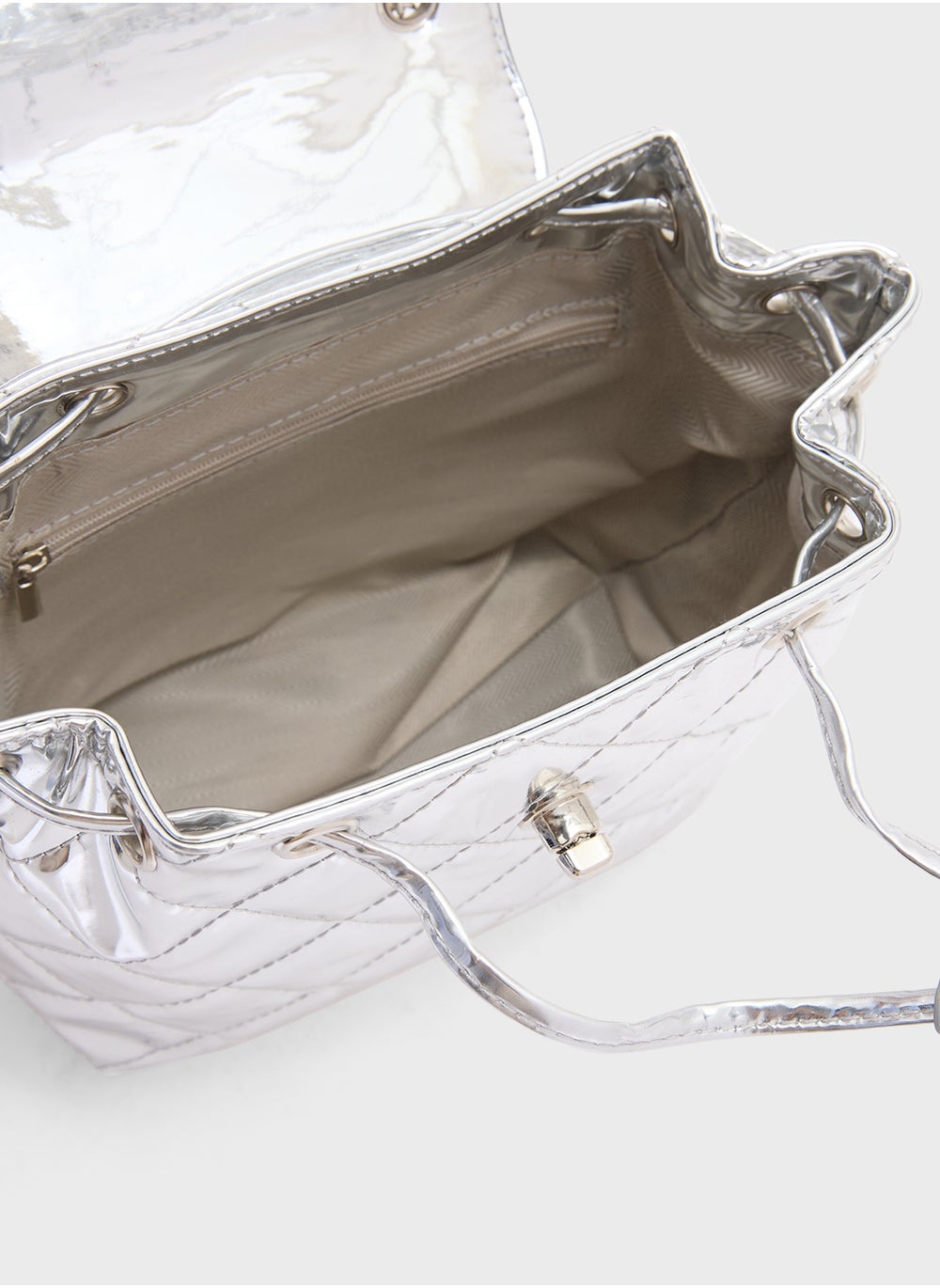 buy-ginger-quilted-metallic-mini-backpack_cp9