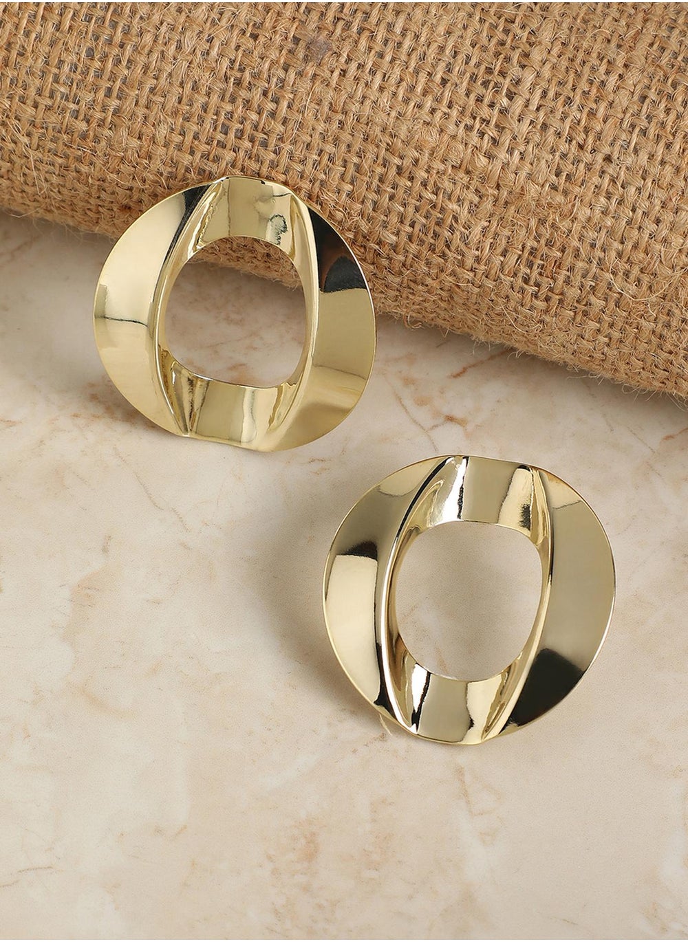 buy-sohi-twisted-circular-drop-earrings_llc