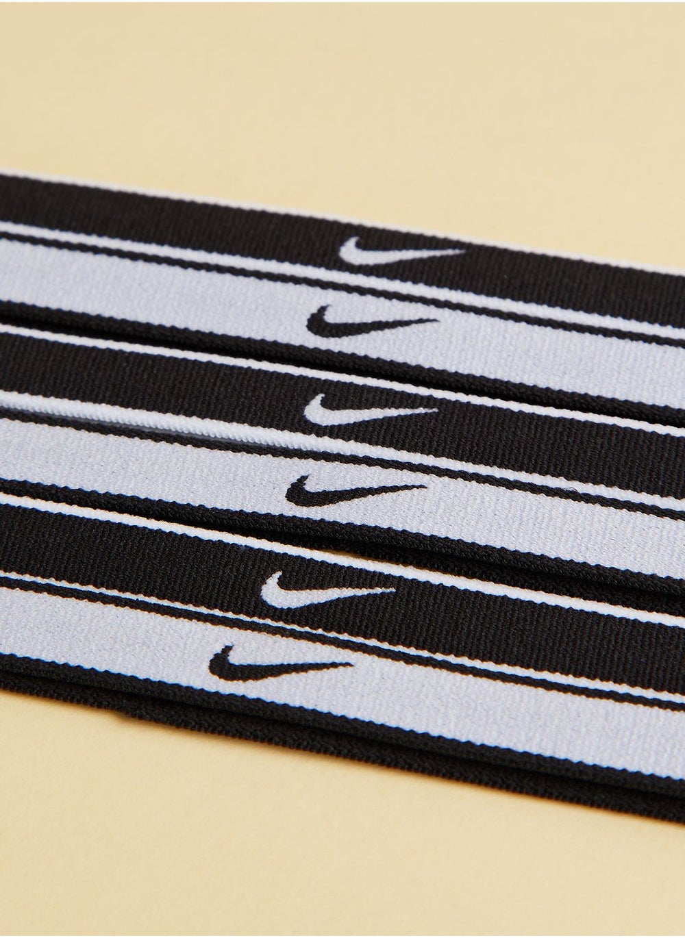 buy-nike-6-pack-swoosh-tipped-headbands_4oi