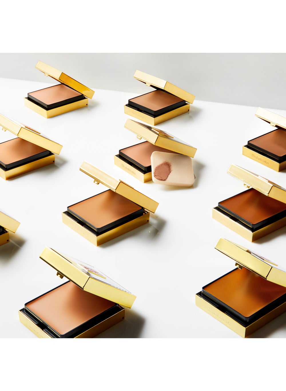 buy-elizabeth-arden-flawless-finish-sponge-on-cream-makeup-foundation-toasty-beige_xd0