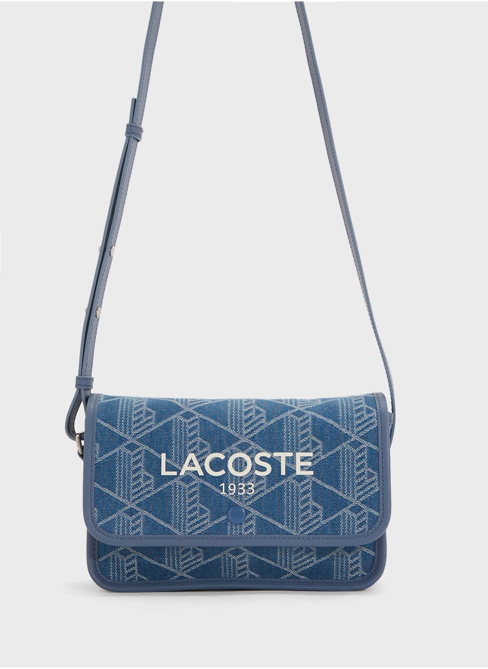 buy-lacoste-monogram-denim-zip-over-crossbody_uye