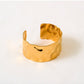 buy-noya-celine-wave-gold-cuff_7xd