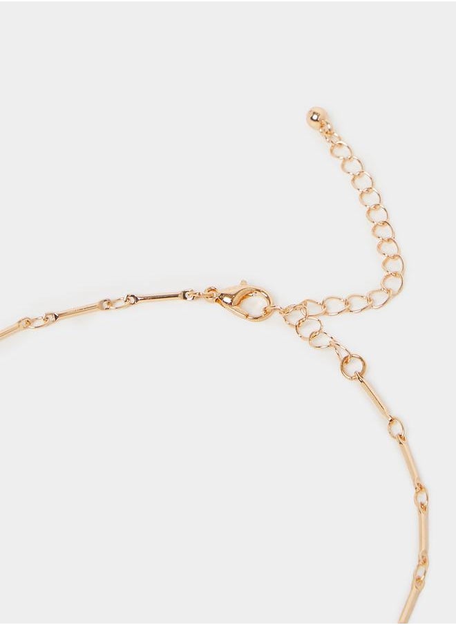 buy-styli-faux-pearl-embellished-multi-charm-necklace_orh