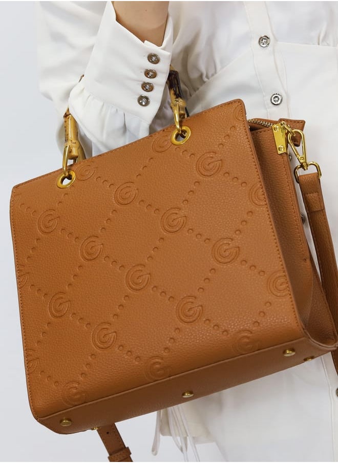 buy-gabriella-gucci-gabriella-gucci-monogram-embossed-tote-bag-with-top-handle-and-zip-closure_mwv