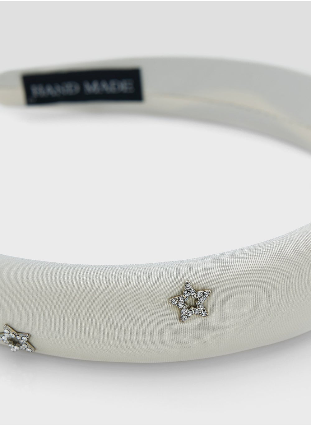 buy-ginger-embellished-star-padded-headband_2jq