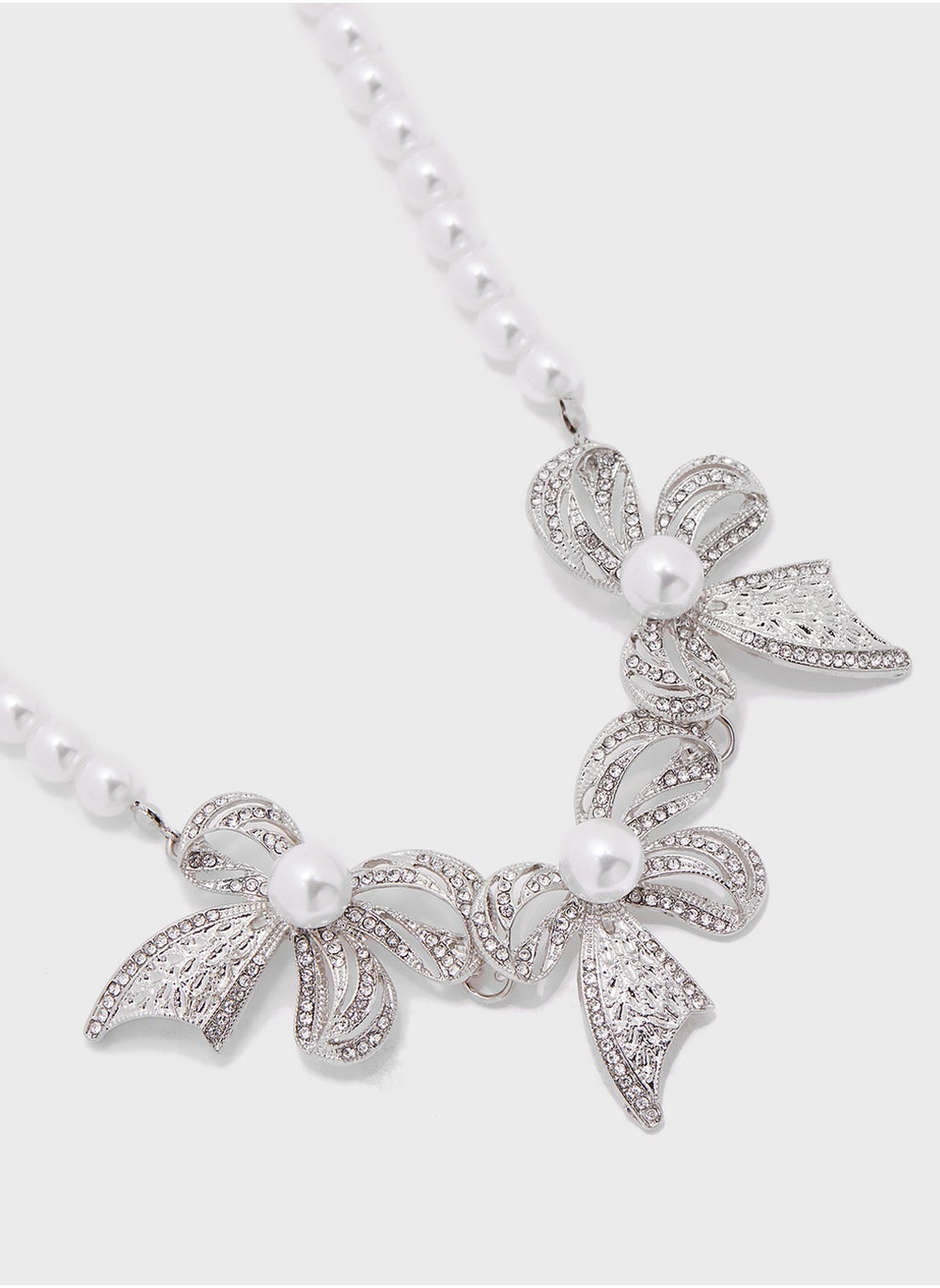 buy-ginger-pearl-detail-diamnate-bow-necklace_yb4