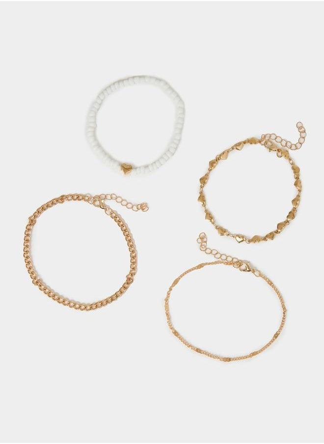 buy-styli-set-of-4-heart-accent-chain-anklets_yf0