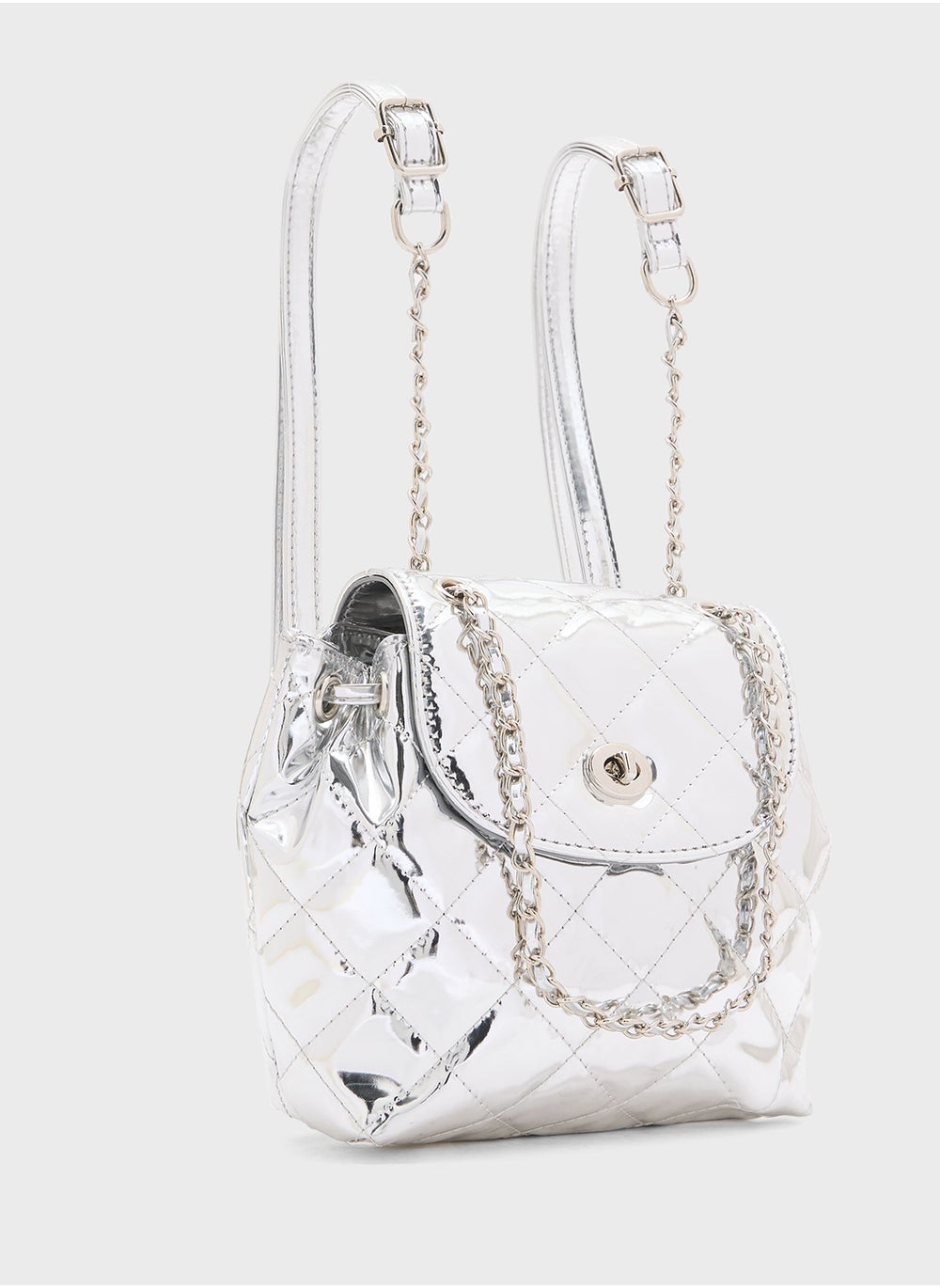 buy-ginger-quilted-metallic-mini-backpack_met