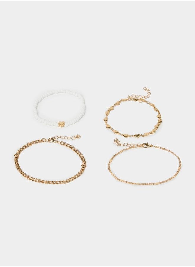 buy-styli-set-of-4-heart-accent-chain-anklets_z0t