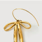 buy-noya-scarlett-bow-drop-earrings-18k-gold-plated_i9j