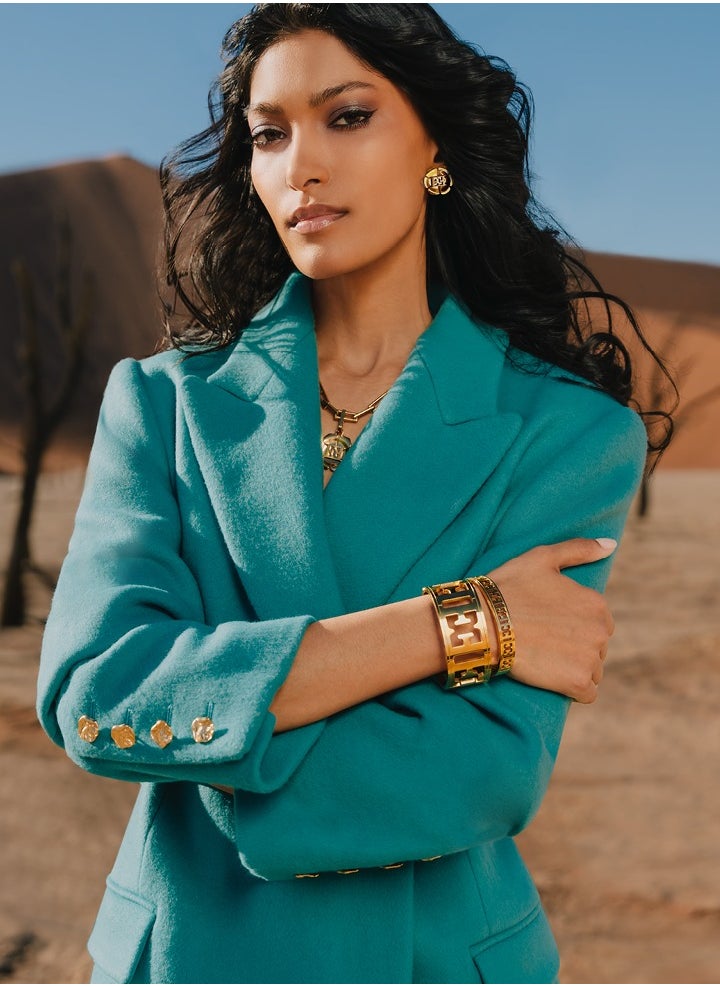 buy-escada-estelle-gold-plated-bangle-with-cutout-logo_k2s