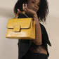 buy-haute-sauce-structured-flap-handbag-yellow_jl7