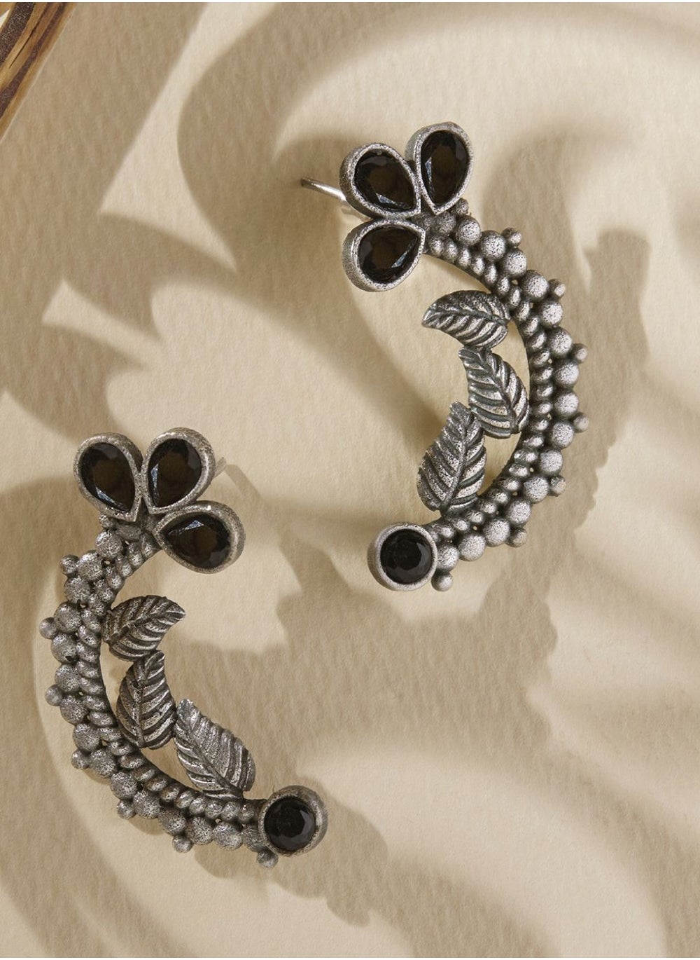 buy-priyaasi-plated-artificial-stones-studded-contemporary-oxidized-kemp-drop-earrings_orx
