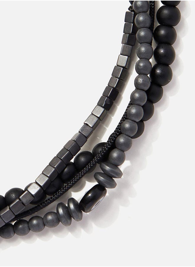 buy-chrysostomos-handmade-adjustable-beaded-multi-line-bracelet-with-onyx-grey-matte-balls-glossy-square-hematite-black-glass-eye-and-string_afr