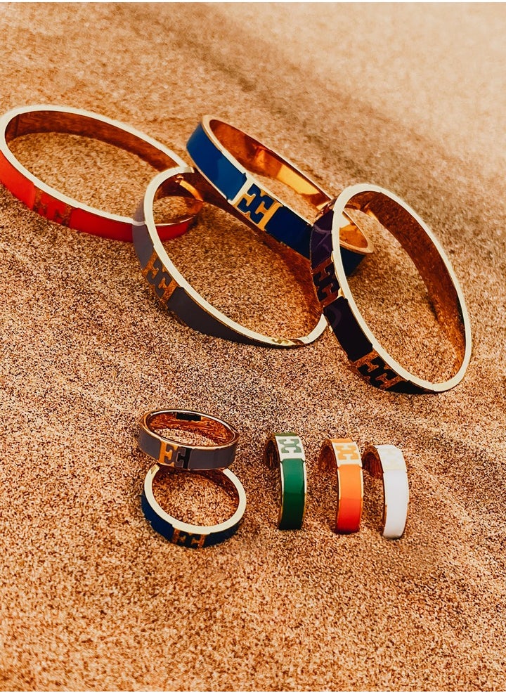 buy-escada-scarlett-gold-plated-ring-with-logo-cutout-and-blue-enamel-detail_e7t