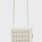 buy-ginger-studded-crossbody-bag_ada