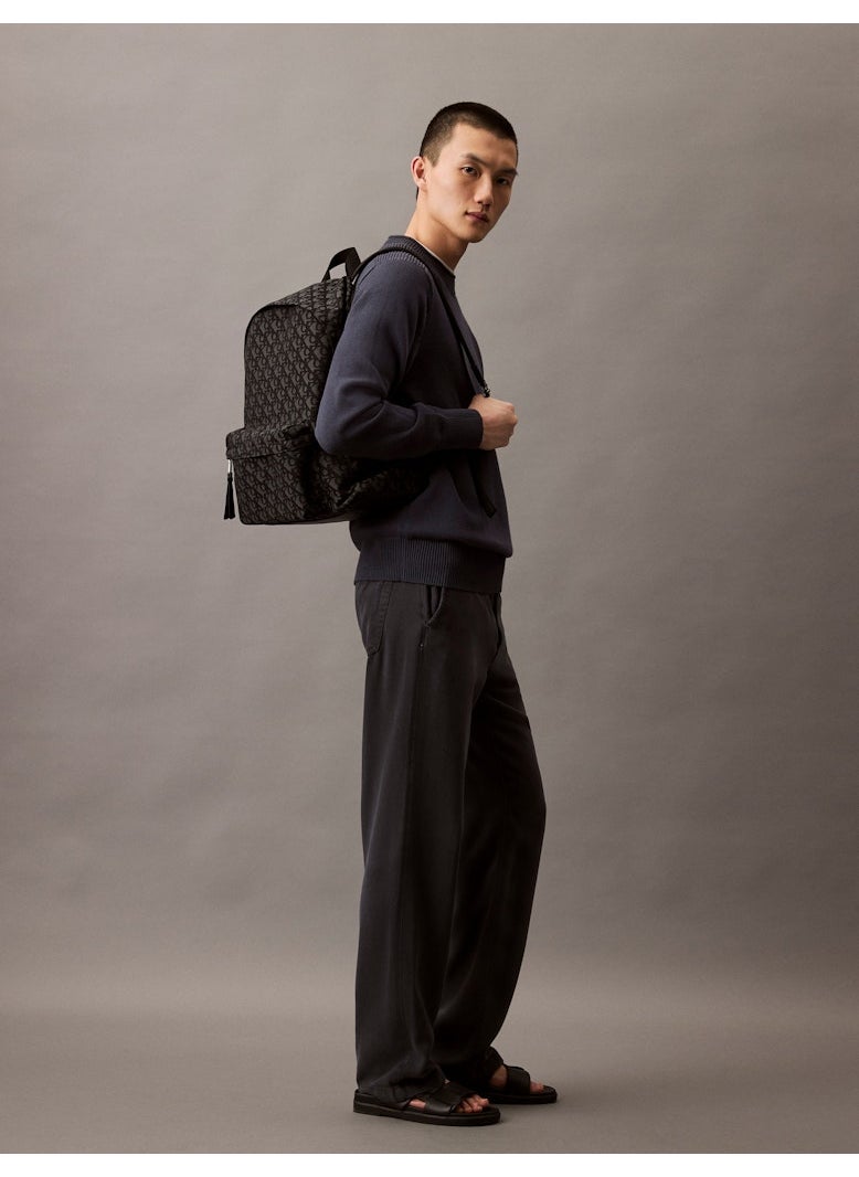 buy-calvin-klein-jeans-logo-detailed-top-handle-zip-over-backpack_b9x