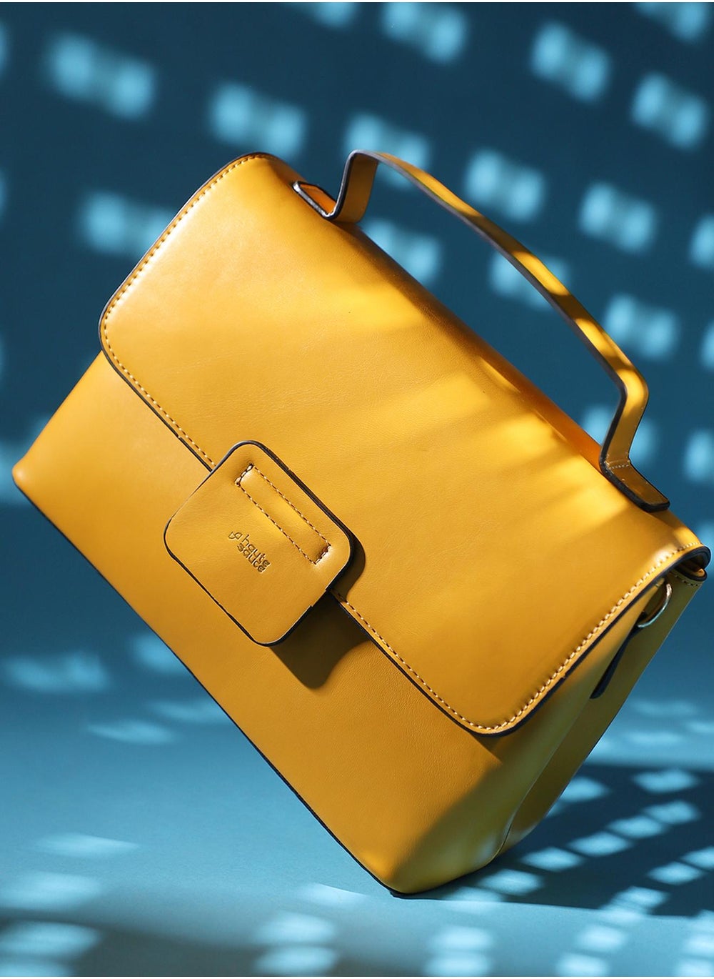 buy-haute-sauce-structured-flap-handbag-yellow_i0i