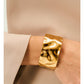 buy-noya-celine-wave-gold-cuff_swd