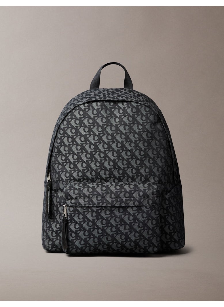 buy-calvin-klein-jeans-logo-detailed-top-handle-zip-over-backpack_x0y