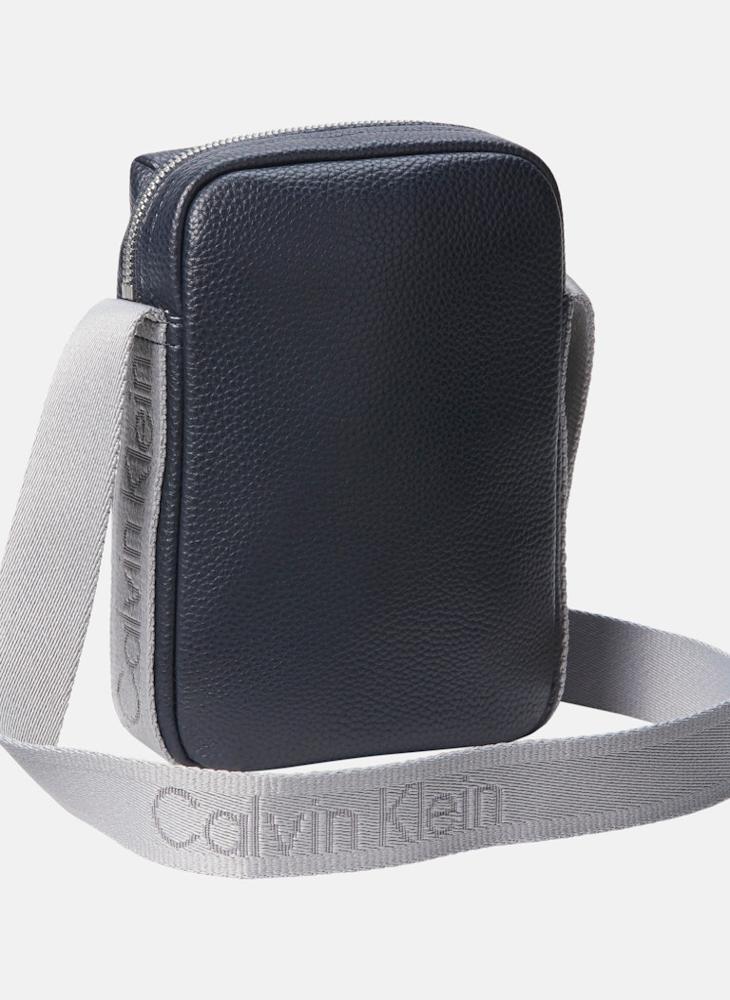 buy-calvin-klein-jeans-logo-cargo-reporter-bag_dqf