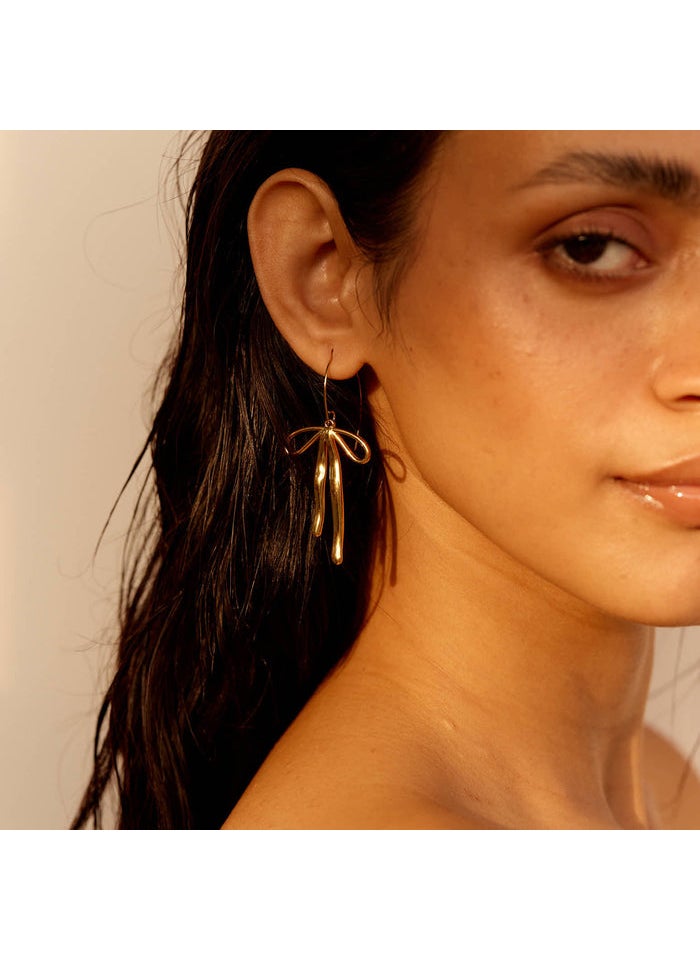 buy-noya-scarlett-bow-drop-earrings-18k-gold-plated_yk4