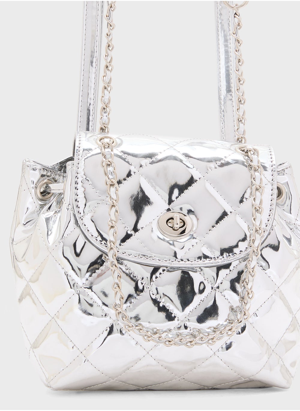 buy-ginger-quilted-metallic-mini-backpack_wbh