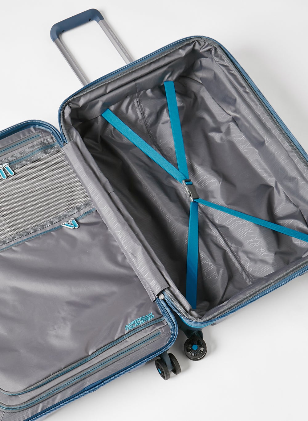 buy-american-tourister-american-tourister-technum-spinner-77-cm-metallic-blue-3-years-global-warranty_lgo