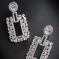 buy-priyaasi-women-white-american-diamond-studded-classic-drop-earrings_uq4