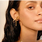 buy-noya-holly-bow-stud-earring-18k-gold-plated_03x