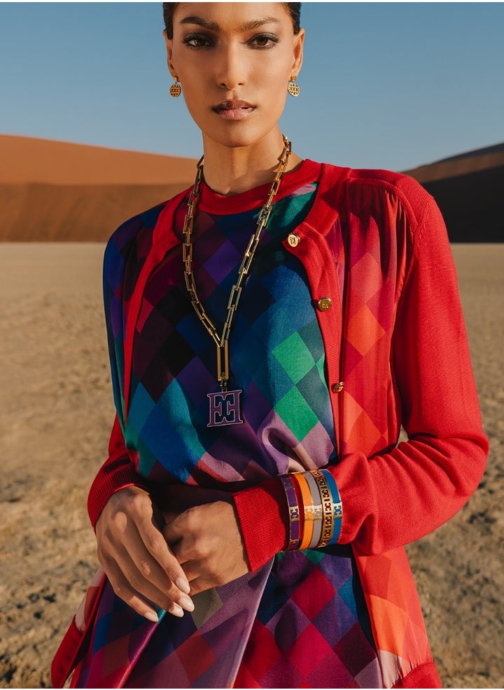 buy-escada-scarlett-gold-plated-bangle-with-logo-cutout-and-black-enamel-detail_nvs