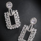 buy-priyaasi-women-white-american-diamond-studded-classic-drop-earrings_zj1