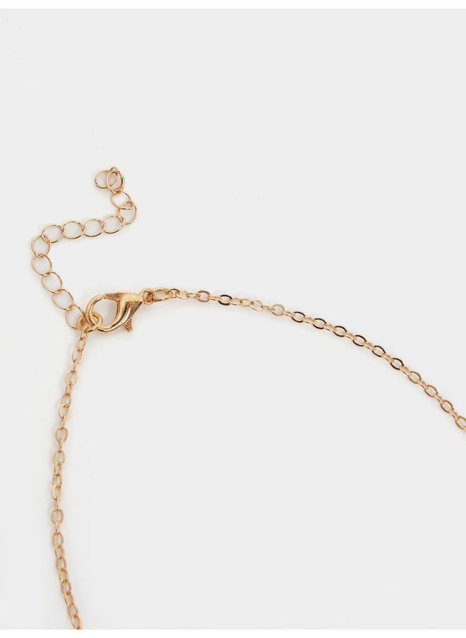 buy-styli-styli-set-of-2-embellished-bow-accent-anklet_rjf