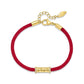 buy-police-gold-plated-monogram-cylindrical-charm-with-crystals-red-cord-bracelet-for-women_mnq