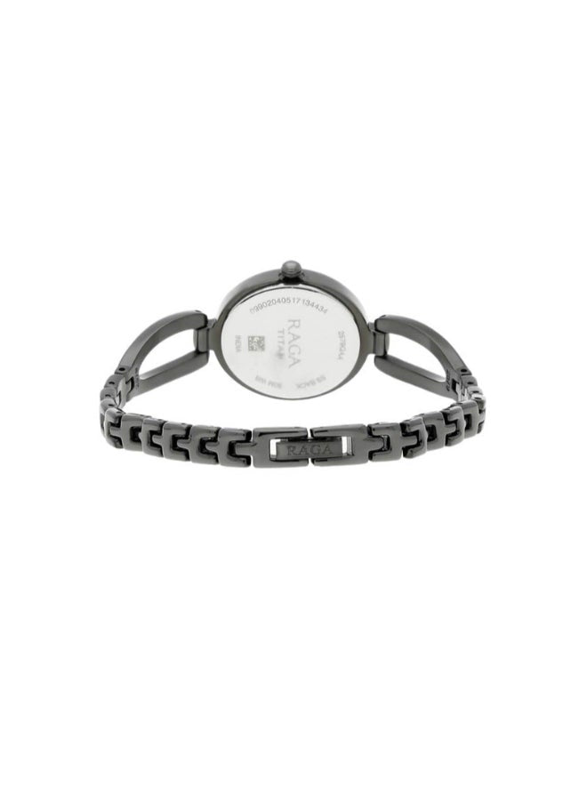 buy-titan-women-analog-oval-shape-metal-wrist-watch-2579qm01-35-5-mm_r95