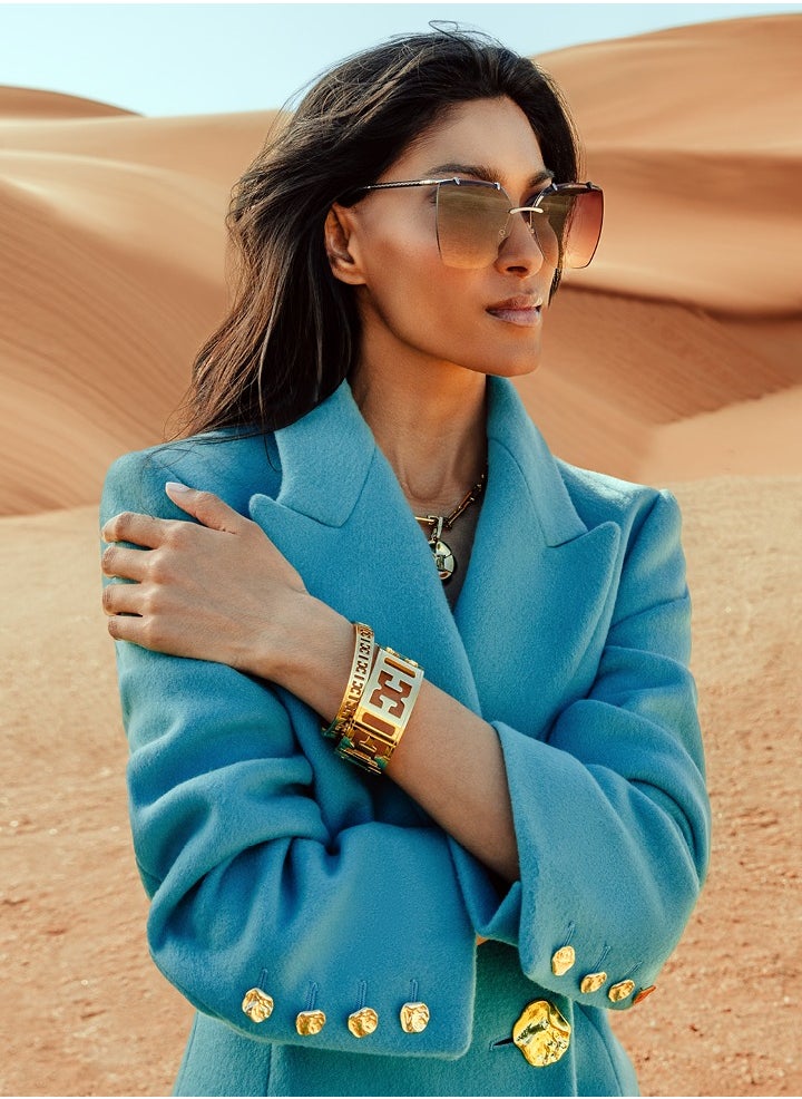 buy-escada-estelle-gold-plated-bangle-with-cutout-logo_cgt