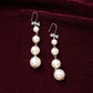 buy-sohi-bow-pearl-drop-earrings-pearl-white_wxh