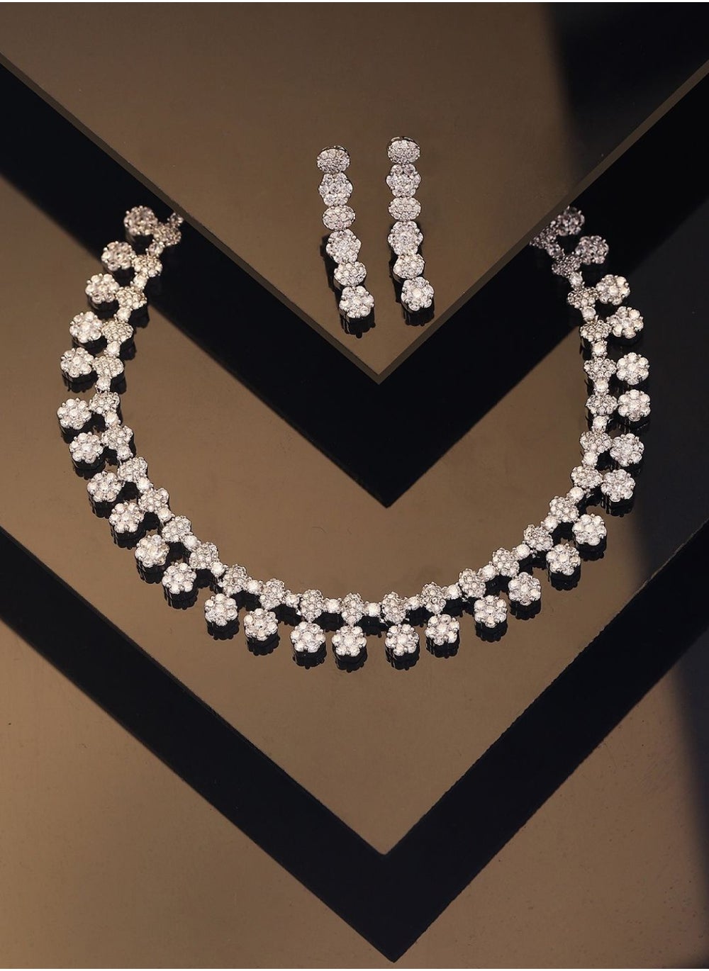 buy-priyaasi-plated-ad-stone-studded-floral-pattern-brass-necklace-and-earrings_peq