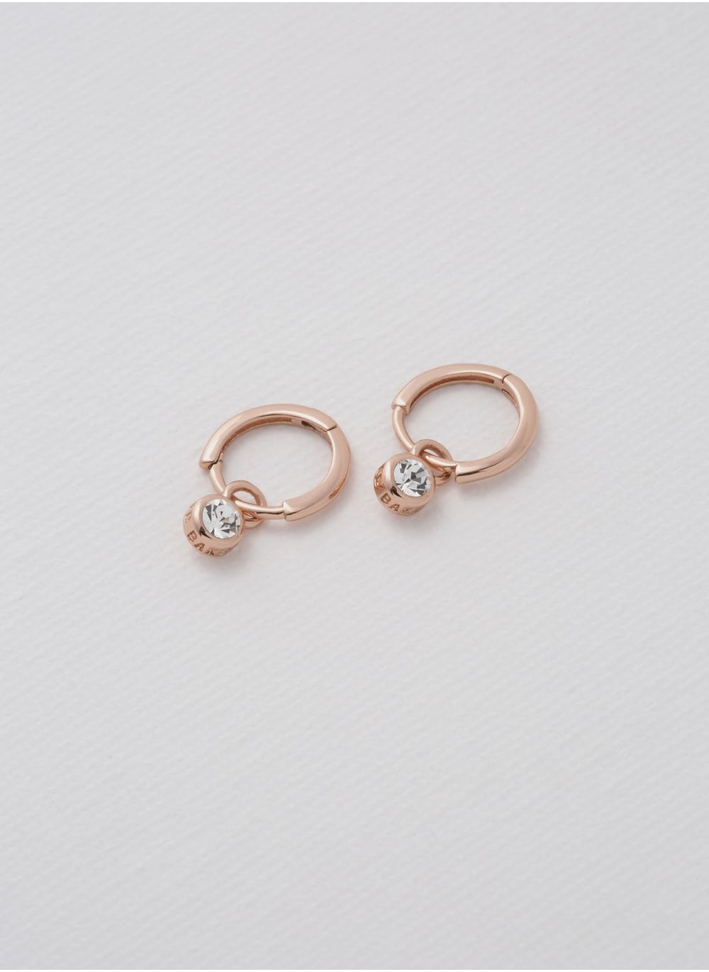buy-ted-baker-sinalaa-crystal-huggie-earrings_zng