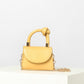 buy-haute-sauce-solid-yellow-handbag-with-a-flap_eof