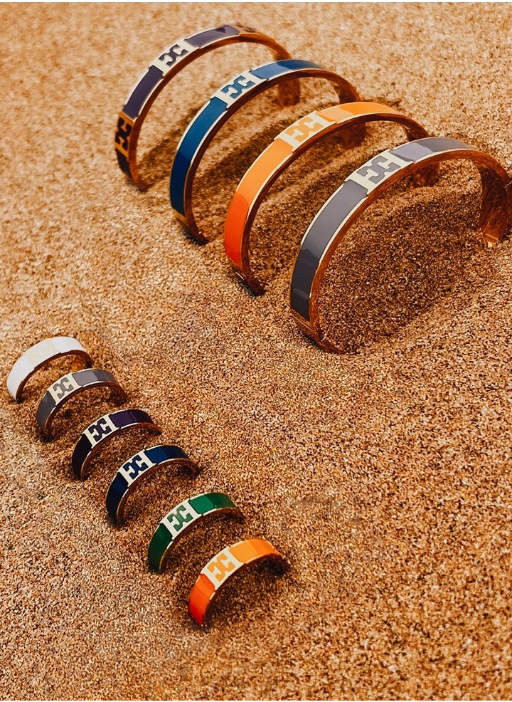 buy-escada-scarlett-gold-plated-ring-with-logo-cutout-and-green-enamel-detail_1ij