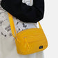 buy-yuniqee-yellow-plain-lifestyle-sling-bag_73p