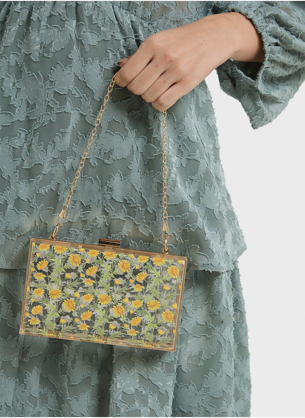 buy-ella-daisy-print-clear-clutch-bag_uus