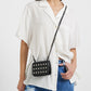 buy-ginger-studded-crossbody-bag_o0t