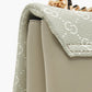 buy-celeste-monogram-print-cross-body-bag-with-flap-closure-and-chain-strap_e7x