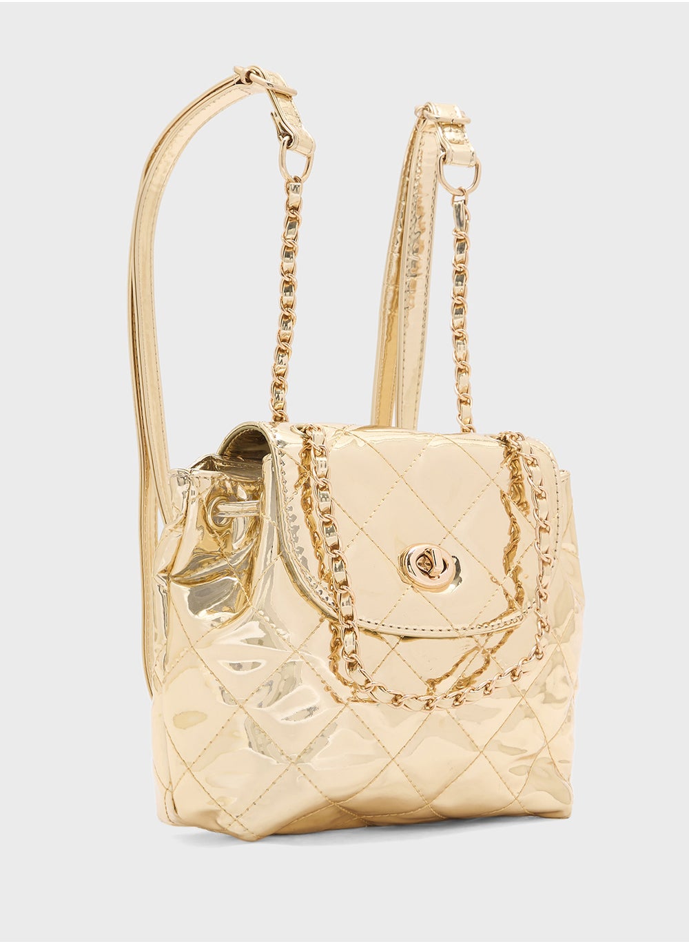 buy-ginger-quilted-metallic-mini-backpack_6kb